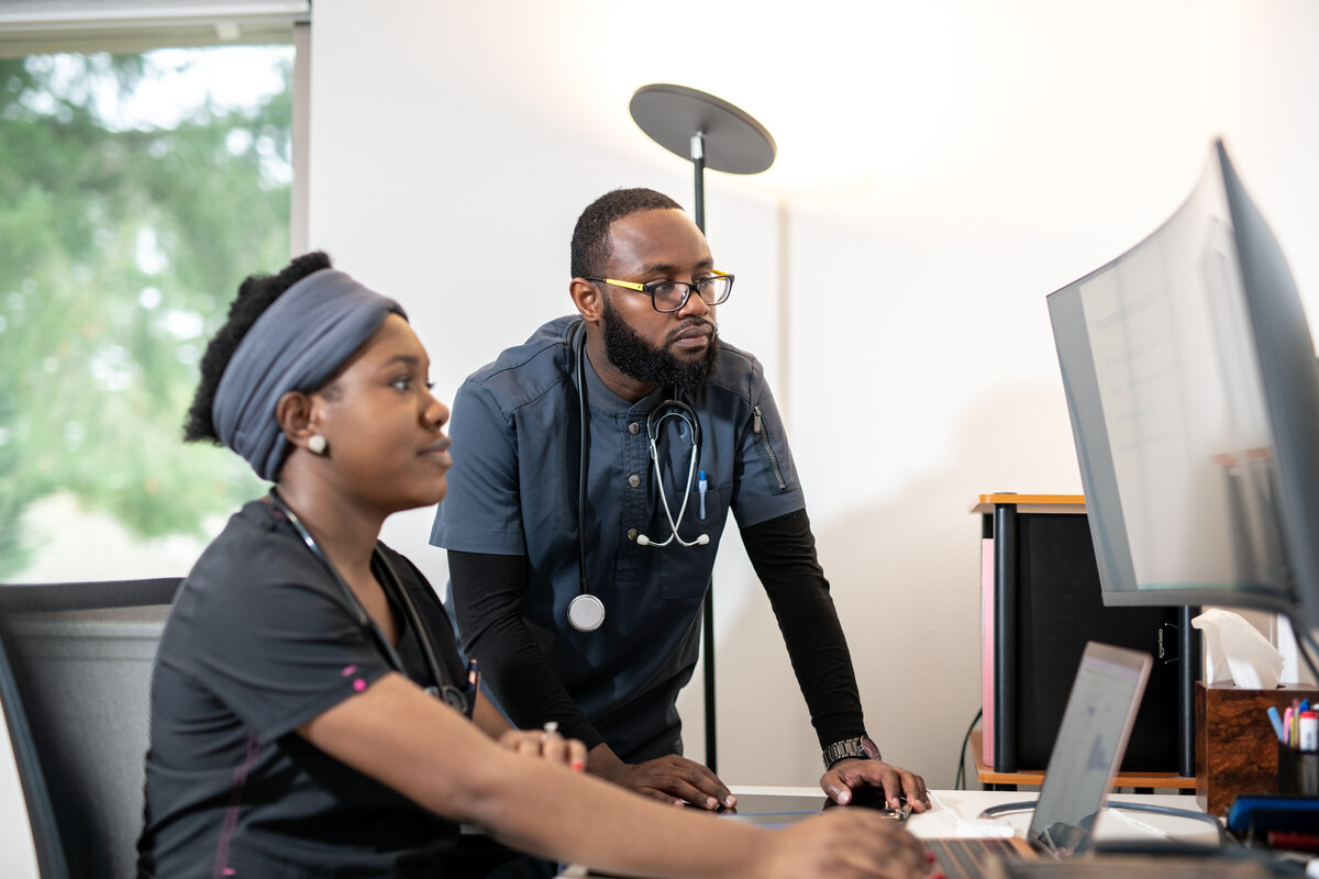 Caregiver and senior resident sharing a warm moment